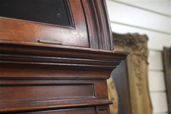 A George III style mahogany domed top bookcase W.112cm